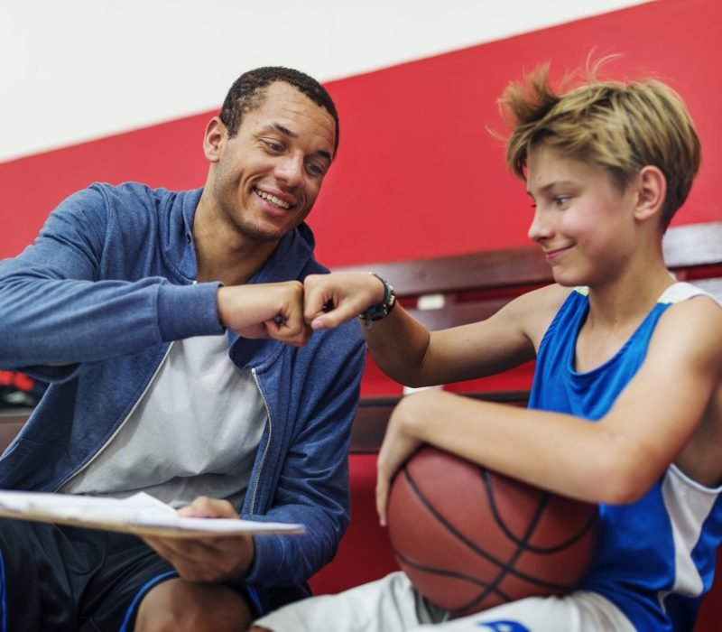 Young basketball player shoot